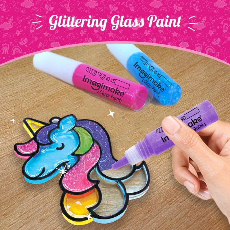 Imagimake glittering glass paint with a unicorn design on a wooden surface.