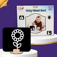 Baby visual card with a child's photo and educational illustrations, alongside a black flower-shaped object on a purple background.