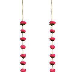 Decorative hanging chain with pink beads and gold tassels on a white background