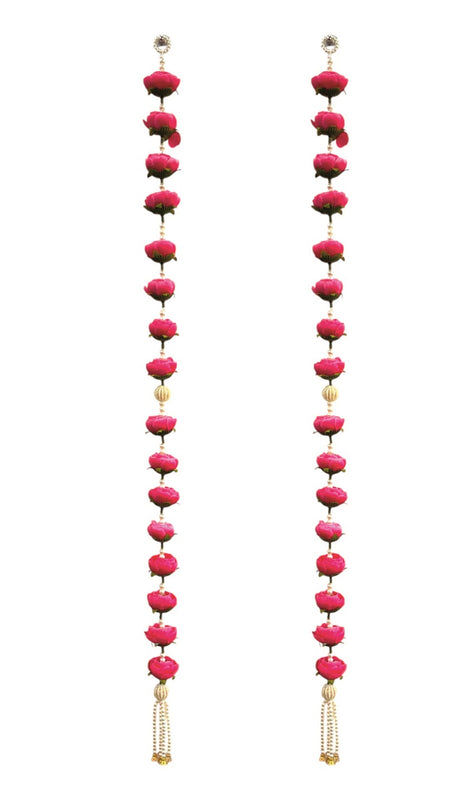 Pair of long earrings with pink beads and gold accents on a white background