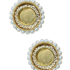 Pair of gold and pearl earrings on a white background