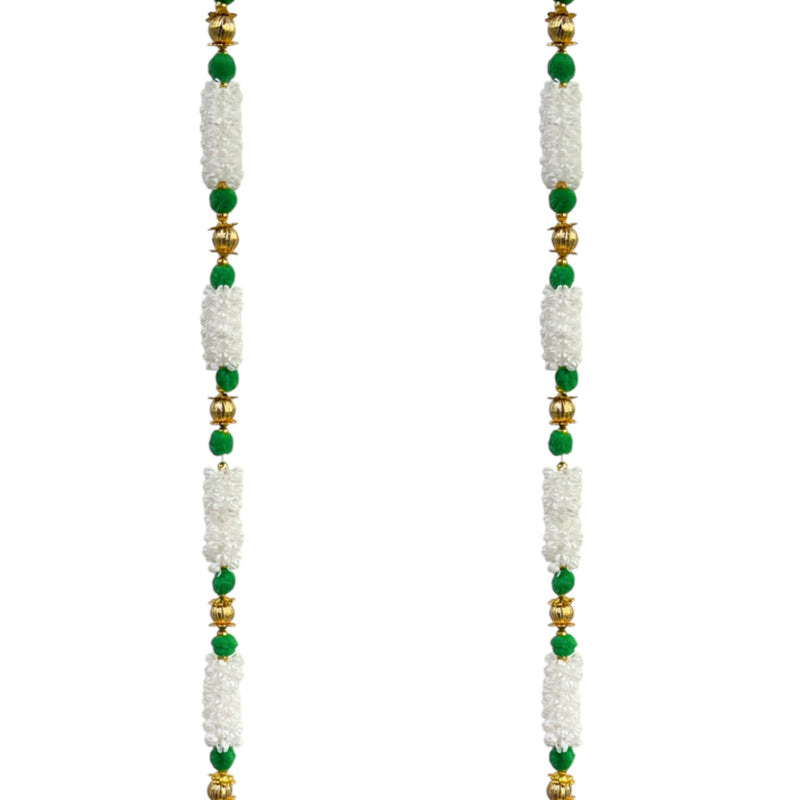 Pair of white and green beaded earrings with gold accents on a white background