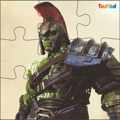 Puzzle with a character in armor and helmet on a beige background, featuring the brand 'Todfod'.