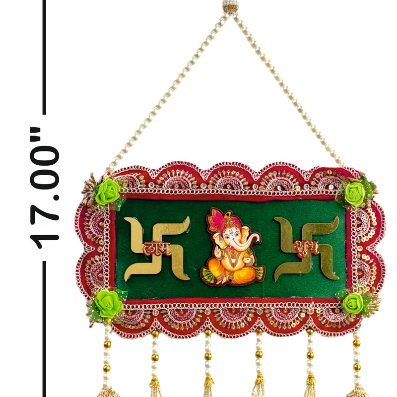 Decorative wall hanging with Swastika and Ganesha design, dimensions indicated.