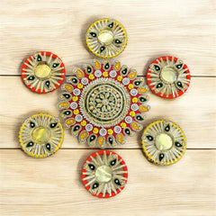 Decorative items with floral patterns on a wooden surface