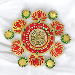 Decorative red and gold circular design with floral elements on a white background