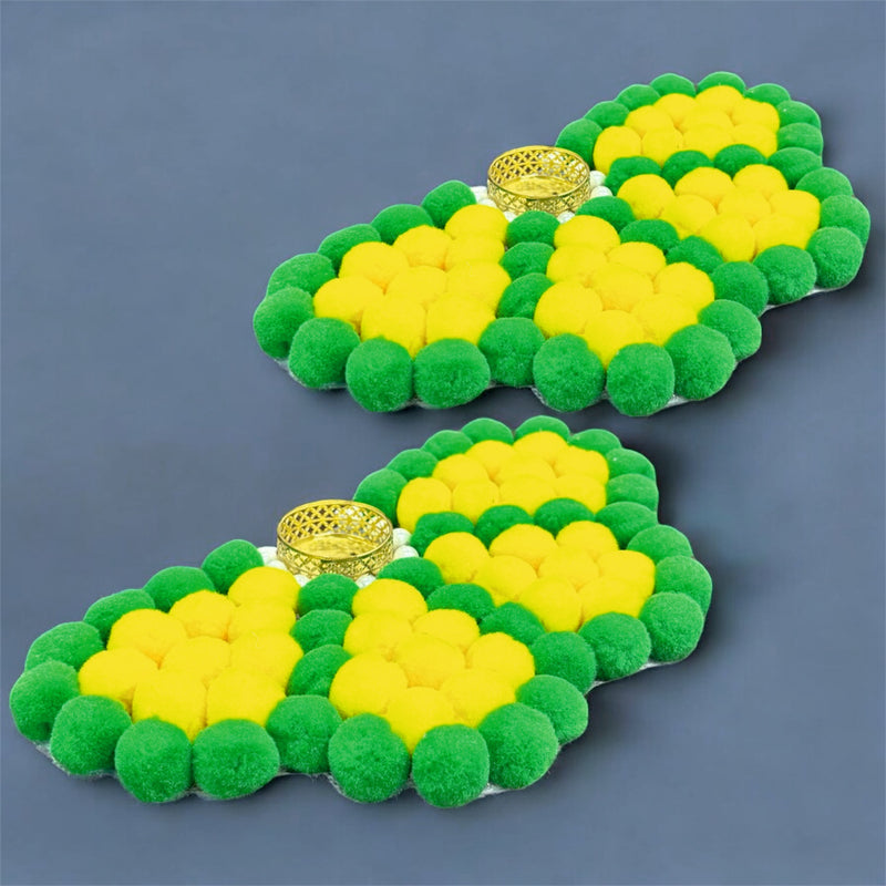 Green and yellow pom-pom slippers on a blue background