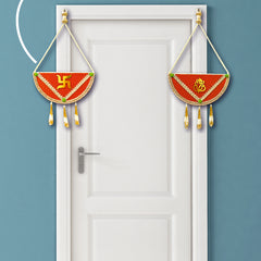 Decorative hanging on a white door with a blue background