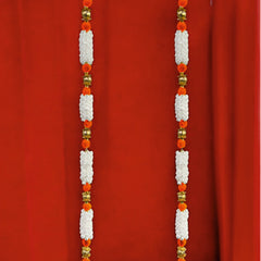 Decorative garlands with white flowers and red beads on a red background