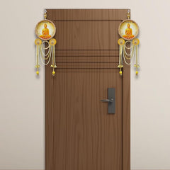 Decorative door hanging with Buddha image on a wooden door.