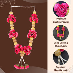 Floral necklace with pink flowers and yellow beads on a brown background
