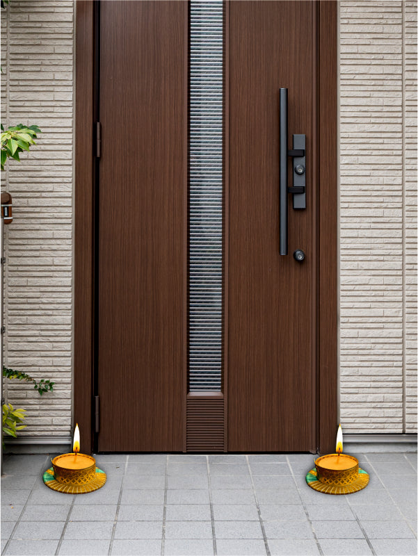 Modern wooden door with decorative lamps on a tiled pavement
