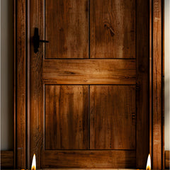 Two lit oil lamps on a wooden floor in front of a wooden door.