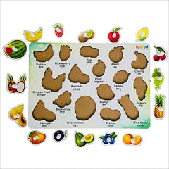 Set of colorful fruit-shaped magnetic letters on a white background