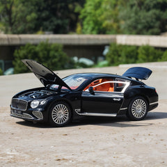Luxury car with open doors on a concrete surface