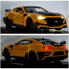 Yellow sports car with black accents on a blurred background