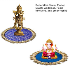 Decorative round platter with statues on a white background