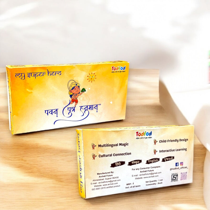 Two educational product boxes with colorful designs on a wooden surface