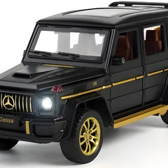 Black toy SUV with gold accents on a white background