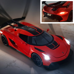 Red sports car model with close-up inset on a gray background