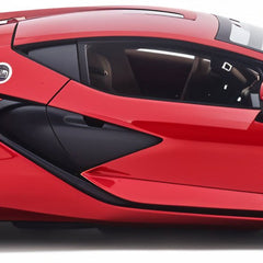 Red sports car model with gold wheels on a white background