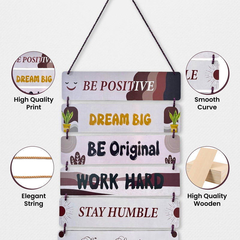 Decorative wall hanging with motivational phrases and quality features highlighted.