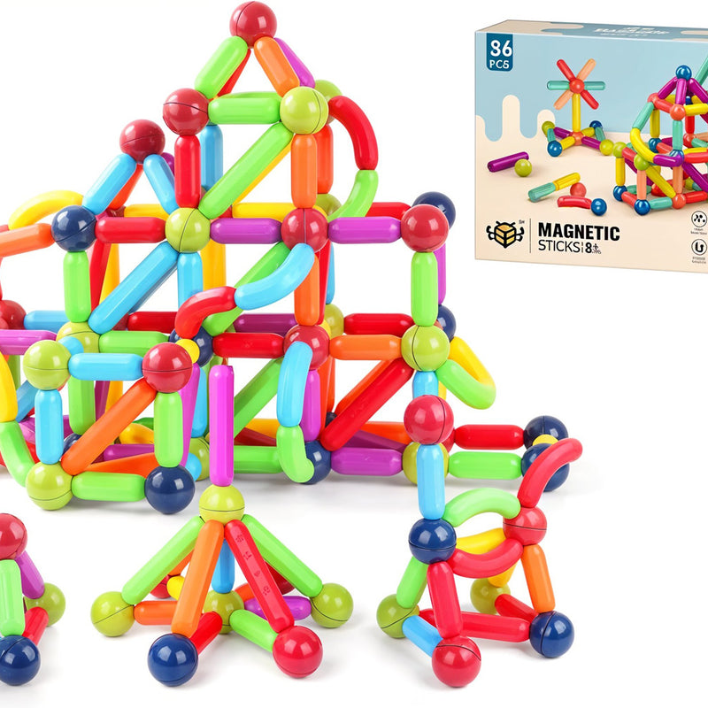 Colorful magnetic building sticks with a box in the background