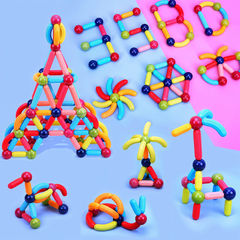 Colorful magnetic building toys on a blue and pink background