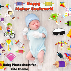 Baby in blue outfit surrounded by colorful kite-themed decorations with 'Happy Makar Sankranti' text.