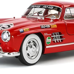 Red vintage car model with racing decals on a white background