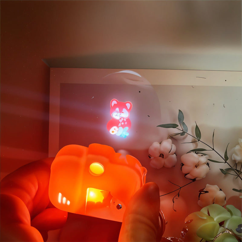 Decorative night light with a bear design on a wall with flowers.