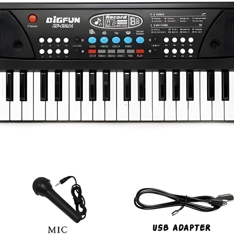 Electronic keyboard with microphone and USB adapter on a white background