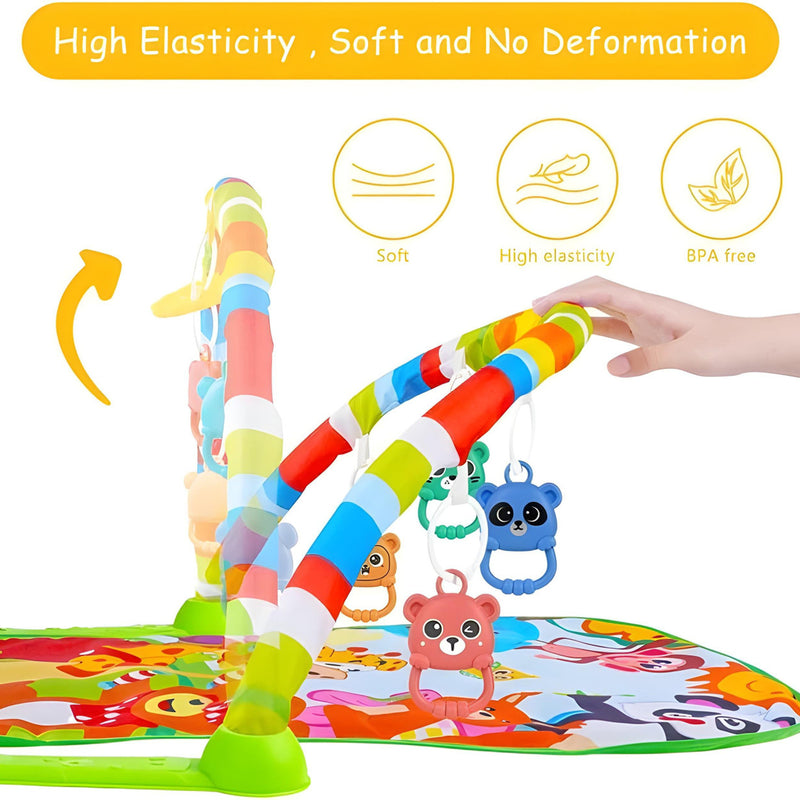 Colorful baby play mat with toys and a hand interacting with it, on a white background.