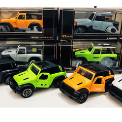 Collection of colorful toy cars in packaging on a white surface