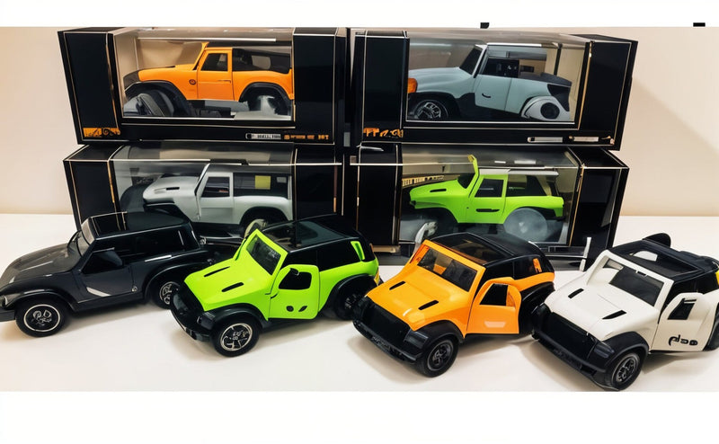 Collection of colorful toy cars in packaging on a white surface
