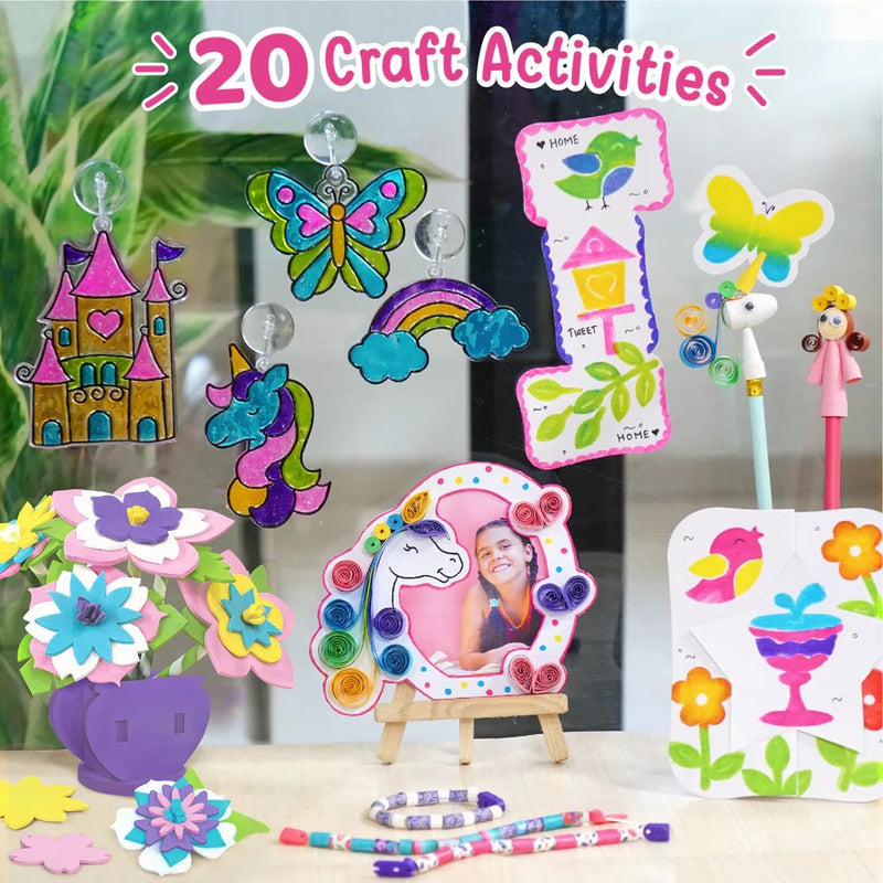 Assorted craft activities including colorful cutouts of a castle, butterfly, rainbow, unicorn, and more on a table.
