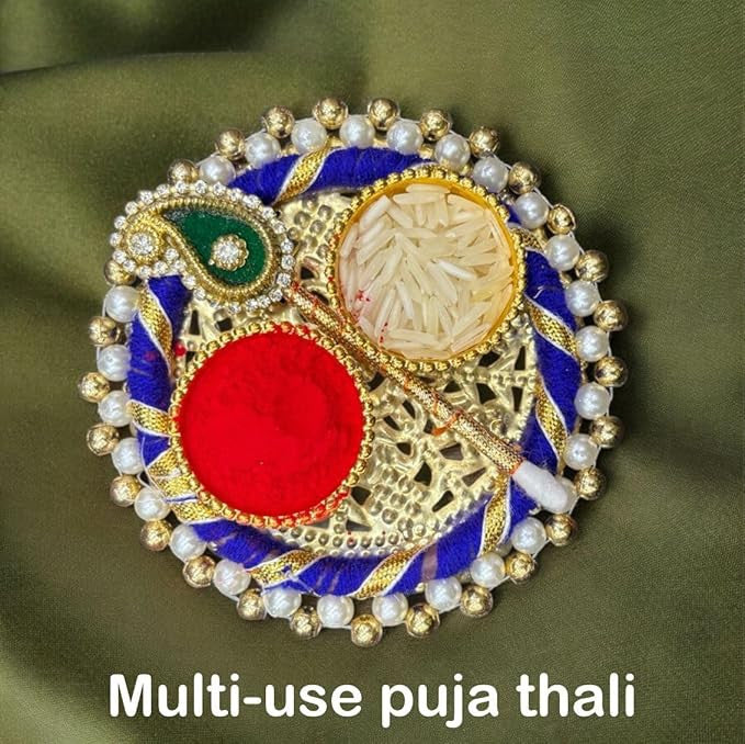 Decorative multi-use puja thali with colorful design on a green background