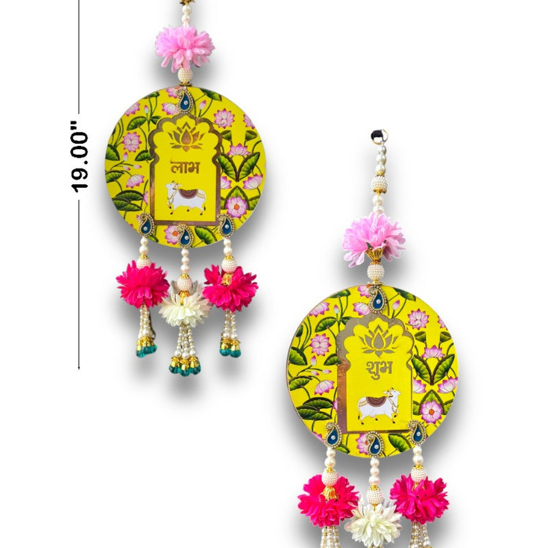 Decorative earrings with floral designs and measurements on a white background