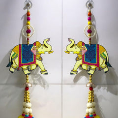 Colorful elephant earrings with decorative elements on a white background