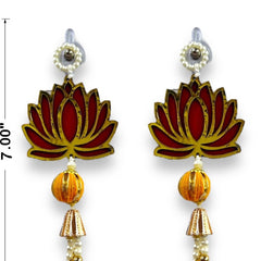 Lotus-shaped earrings with orange and gold accents on a white background