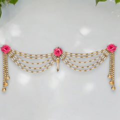 Decorative headband with pink flowers and gold beads on a white background