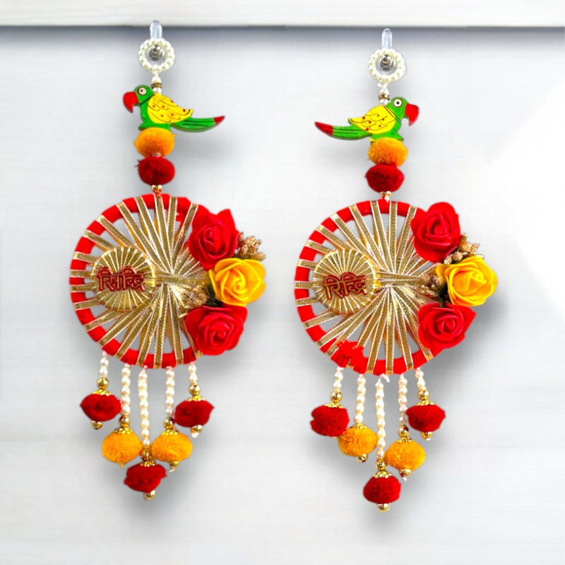 Colorful earrings with floral and decorative elements on a white background