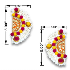 Pair of decorative earrings with measurements on a white background
