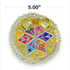 Decorative round object with colorful design and gold accents, labeled '5.00