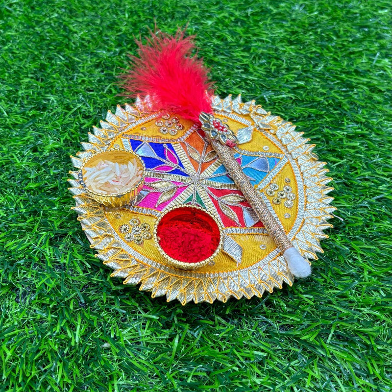 Decorative item with colorful design on a green grass background
