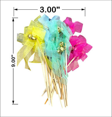 Colorful decorative sticks with ribbons and measurements on a white background