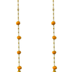 Pair of yellow floral earrings with gold accents on a white background