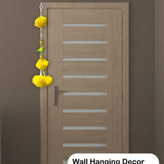 Yellow wall hanging decor on a door with a brown background