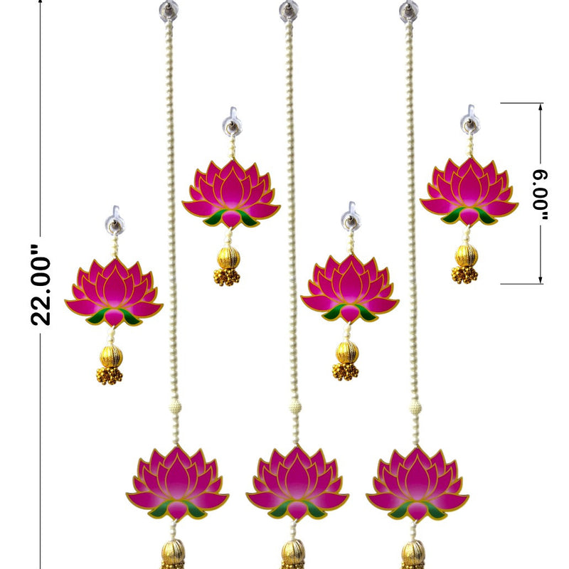 Set of pink lotus earrings with gold accents on a white background