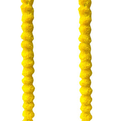 Two yellow textured candles on a white background